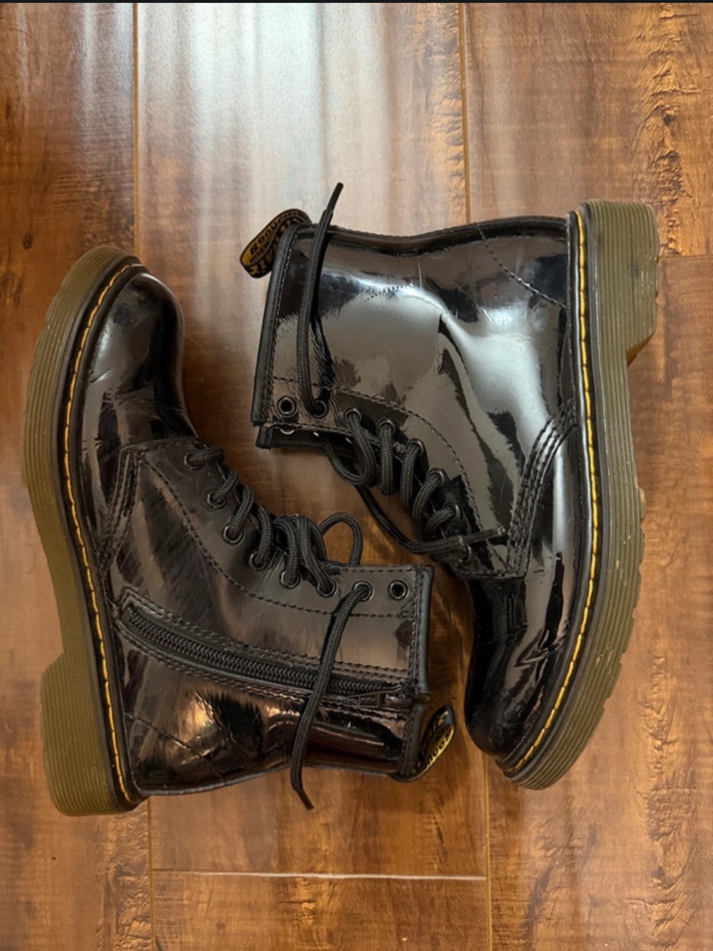 Dr. Martens Black Patent Lace-Up Boots with Yellow Stitching
